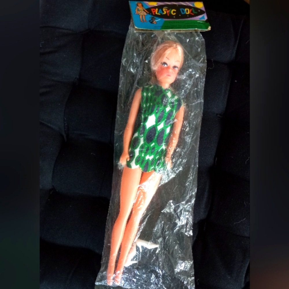 Vintage Plastic Doll in Green Dress